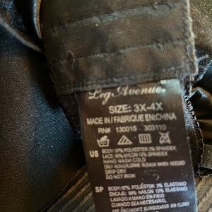 Size 3X – 4X satin and lace bodice. Brand is Legg Avenue.